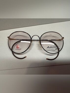 Unisex Round Metal Frame Glasses in Black and Gold - AutoFlex Flexon by Marchon